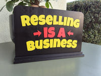 Reselling is a business Sign