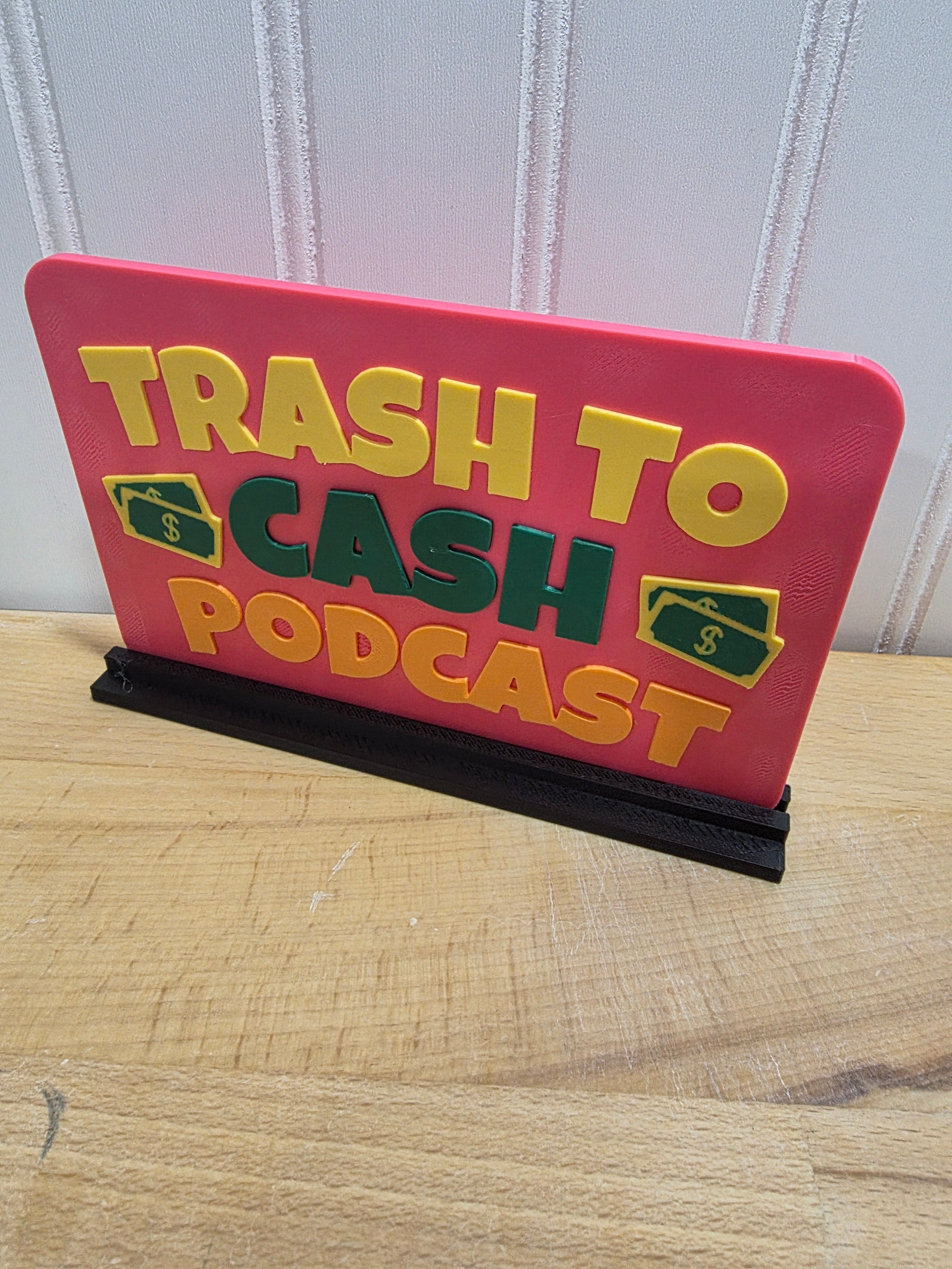 Pink trash to cash podcast sign